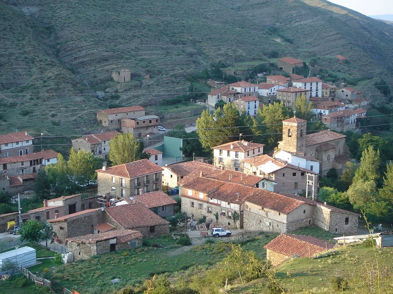 Houses and trees in Cabezón de Cameros in La Rioja