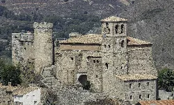 Church and castle of Cornago with medieval walls and towers.