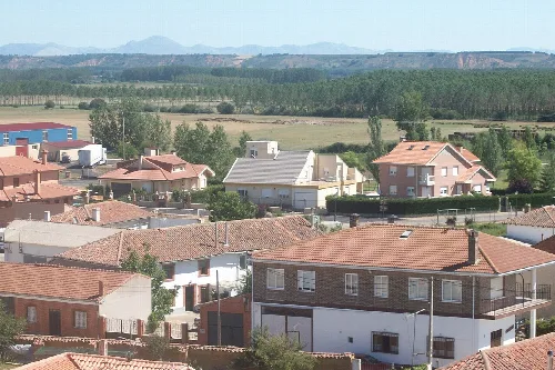 View of houses and fields from the church tower in Santervás de la Vega.
