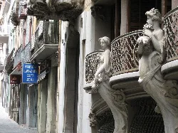 Sculptures on the balconies of Casa Solà Morales in Olot.
