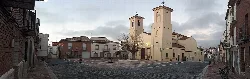 Main square with church and houses in Zarza de Tajo.