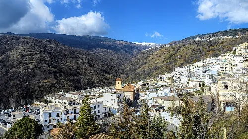 Winter view from above the town of Pampaneira, one of the white villages of Las Alpujjaras, Andalucia, Spain