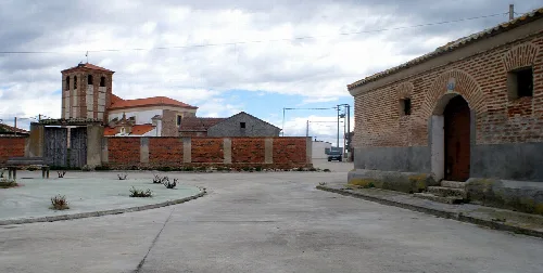 View of Aguasal, Valladolid, Spain, with the church and the granary.