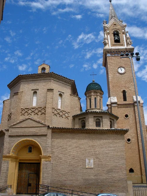 San Miguel Church with tower and bell tower in Fuentes de Ebro.