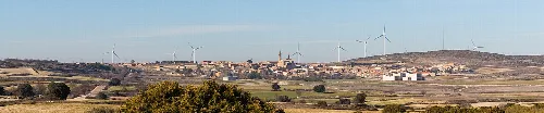 Landscape with hills, windmills, and houses in Fuendetodos.