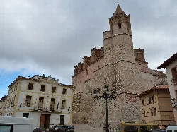 Town hall and church in Montalbán with a medieval tower.