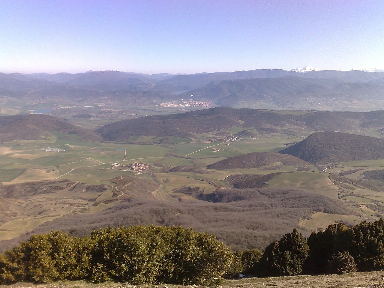 Part of Itzagaondoa valley (Ardanatz, Iriso...) seen from mount Itzaga; farther you can see a bigger town, Agoitz (es Aoiz). Navarre, Basque Country.