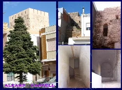 Imágenes del castillo medieval de Alfarb, con muros y torres antiguas en Valencia.