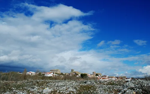 Panoramic view of Villaescusa de Haro with sky and clouds.