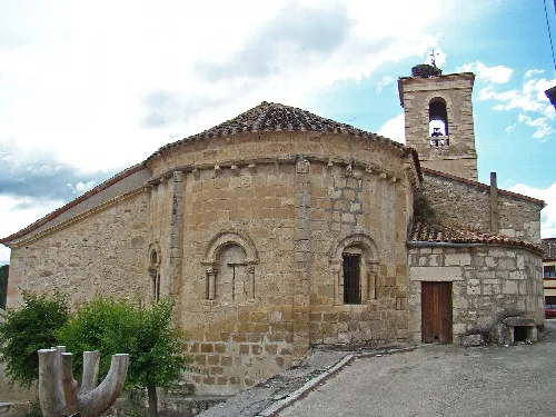 Stone apse and bell tower in Sacramenia.