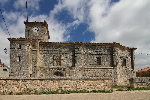 Stone church with tower and walls in Modúbar de la Emparedada.