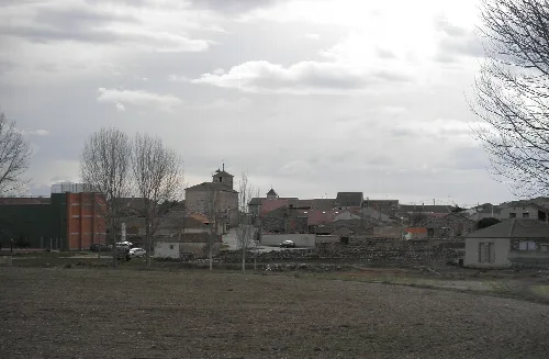 View of houses and a church in Melque de Cercos.
