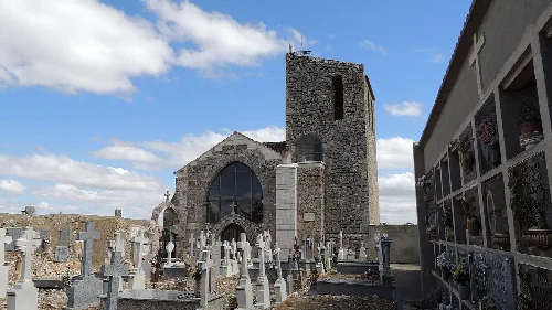 San Gregorio chapel in Fuentesoto with cemetery and stone structure.