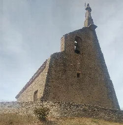 San Martín chapel in Añorbe, built of stone with a bell tower at the top.