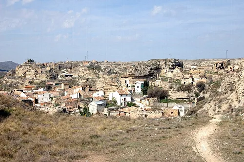 View of houses and arid landscape in Terrer, Zaragoza.