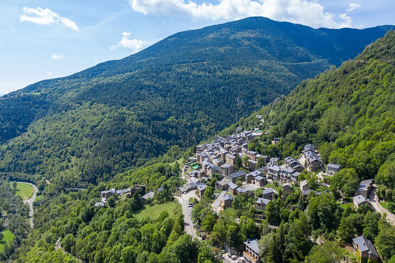 Queralbs village surrounded by mountains and forests.