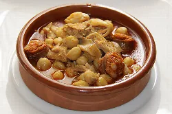 Stew in a clay pot with chickpeas and meat.
