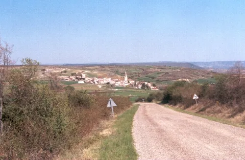 Landscape with village and river in La Alcarria, seen from a rural road.