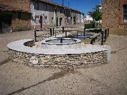 Water well with stone and iron structure in Turcia, León, built in 1931.