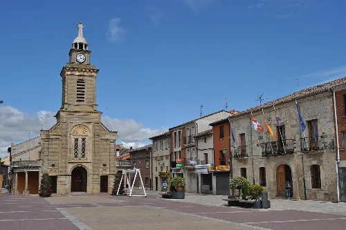 Square with church and buildings in Melgar de Fernamental.