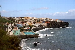 White houses and a swimming pool by the sea in San Juan de la Rambla, Tenerife.