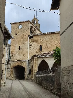 Tower with clock and passage in Abárzuza