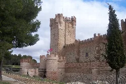 Stone towers and walls of La Mota Castle in Medina del Campo.