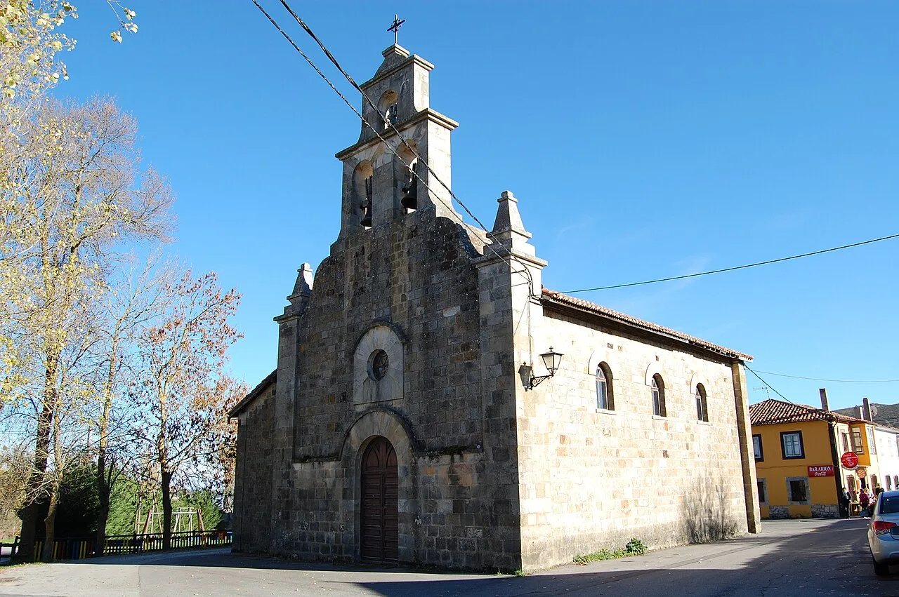 Stone church with bell tower in Las Rozas de Valdearroyo.