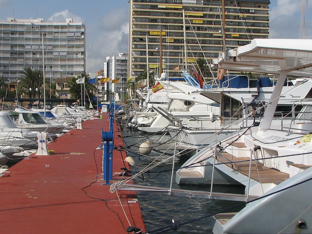 Yachts and boats docked at the marina in Puebla de Farnals.