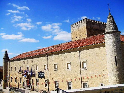 Dominican convent in Caleruega with stone walls and towers.