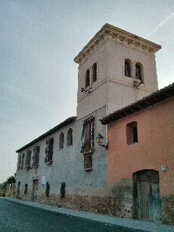 Torre del Virrey in La Eliana, Valencia, with stone structure and arched windows.
