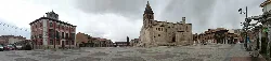 Square with church and surrounding buildings.