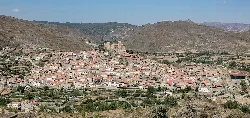 View of Cornago with church and castle on the hilltop