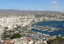 Aerial view of the port, city, and mountains in Águilas.