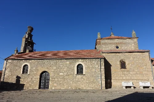 Stone church with bell tower in Cabrillas, Salamanca.