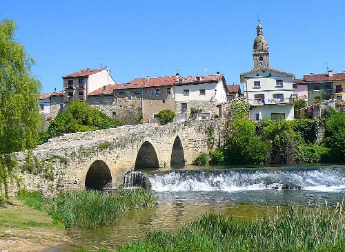 Stone medieval bridge over the Zadorra river in La Puebla de Arganzón.