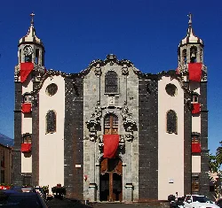 Facade of the church with towers and baroque decoration in La Orotava.