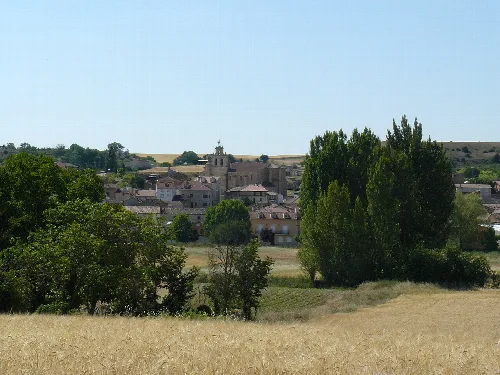 Rural landscape with church and fields in Hontoria de Valdearados.