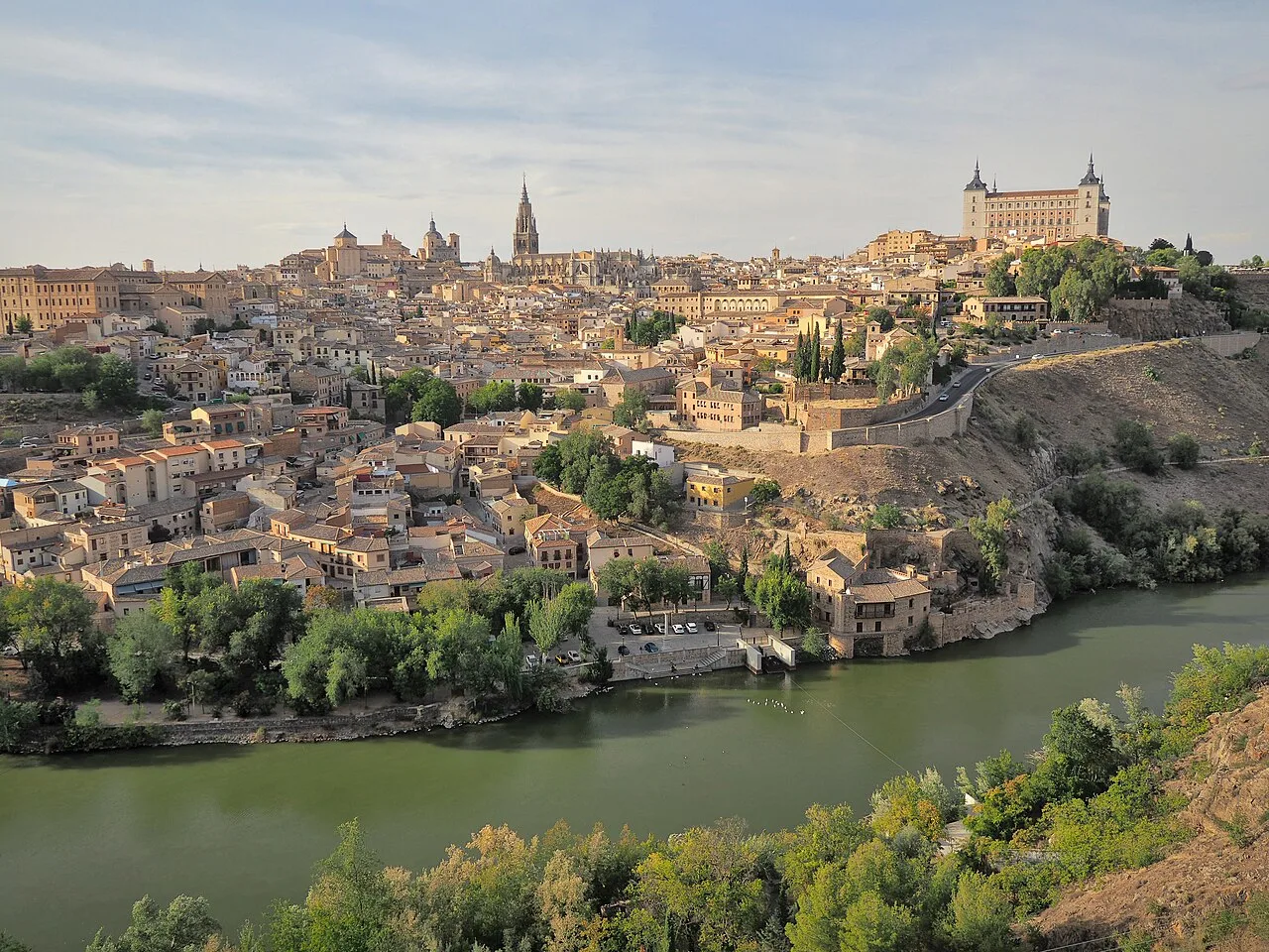 Panoramic view of Toledo with river and historic city.