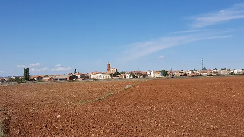 Rural landscape with town and farmland in Zaragoza.