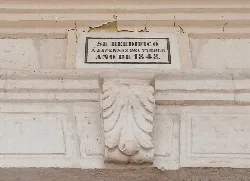 Old plaque on the church portico in Horche.
