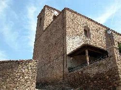 Church of the Assumption with tower and clock in San Román de Cameros.