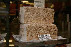Large piece of Alicante nougat in a shop window.
