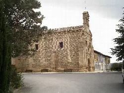 Stone church facade with baroque details in Corella.