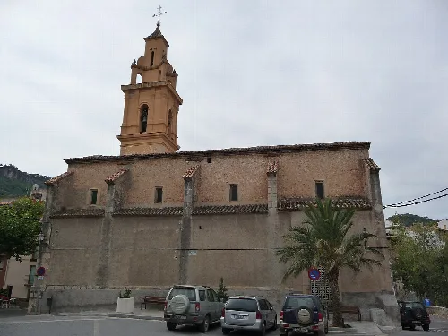 San Bernardo Church with tower and simple facade in Cirat.