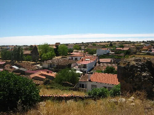 Panoramic of Cerralbo from the castle, with houses and hills in the background.