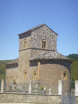 Stone church with two-level bell tower in Nabaskotze.