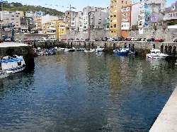 Harbor with boats and buildings in Malpica de Bergantiños.