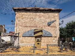 Meteorite sculpture on a building facade in Berlangas de Roa.