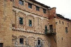 Facade of a palace with windows and Renaissance details in Casalarreina.